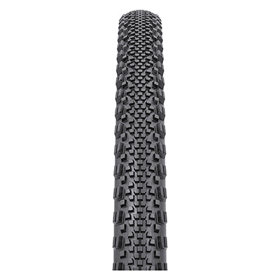 Close-up of a 700x40 Black/Black Raddler TCS Light Fast Rolling Bicycle Tire, highlighting its tall, toothy outer lugs and centered tread, designed for optimal performance on dirt, gravel, or loose terrain.