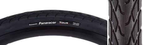 Close-up of the 700x42 Tour Bicycle Tire, showcasing its deep, aggressive tread designed for durability on rough urban roads.