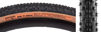 Close-up of the 700x42 Resolute TCS Light Fast Rolling Bicycle Tire, showcasing its small, square knobs and ample spaces designed for all-season gravel riding, with a tread optimized for efficiency and durability.