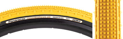 Close-up of the 700x43 Mustard/Black Gravel King SK Bicycle Tire, highlighting its square knobs and continuous ridges designed for smooth rolling and excellent grip on rough or gravel roads.