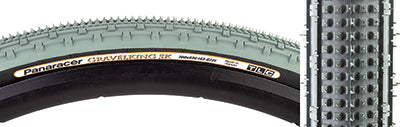 Close-up of the 700x43 Olive/Black Gravel King SK Bicycle Tire, highlighting the five rows of square knobs and double rows of continuous ridges designed for smooth rolling and superior grip.