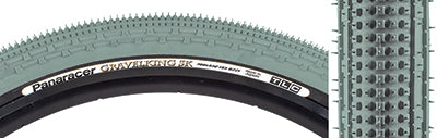 Close-up of the 700x43 Olive/Brown Gravel King SK Bicycle Tire showing five rows of square knobs and double continuous ridges for smooth rolling and excellent grip.