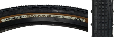 Close-up of the 700x43 Black/Brown Gravel King SK Bicycle Tire, highlighting its square knobs and continuous ridges designed for smooth rolling and excellent grip on rough or gravel roads.