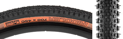 Close-up of the 700x45 Black/Tan Riddler TCS Light Fast Rolling Bicycle Tire, showcasing its densely packed tread and prominent side knobs, designed for optimal traction and cornering on various trail conditions.