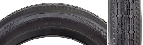 Close-up of a 12-1/2x2-1/4 Street Bicycle Tire showcasing its shallow, grooved tread designed for urban and recreational use in multiple conditions.