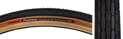 650Bx38 Randonnee Bicycle Tire close-up showing detailed tread pattern and durable synthetic rubber construction, ideal for long-distance cycling on various terrains.