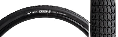 Close-up of the 650Bx47 DTR-1 DC Fold Bicycle Tire, featuring medium-sized knobs, deep siping, and a smooth, round profile, designed for fast rolling on pavement and hard-packed dirt.