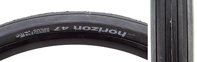 Close-up of the 650Bx47 Black/Black Horizon Road TCS Bicycle Tire, highlighting its smooth centerline and herringbone tread pattern designed for versatile performance on both pavement and dirt roads.