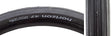 Close-up of the 650Bx47 Black/Black Horizon Road TCS Bicycle Tire, highlighting its smooth centerline and herringbone tread pattern designed for versatile performance on both pavement and dirt roads.