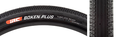 650Bx47 Boken Plus TLR Bicycle Tire: close-up of black tire with white text, showcasing four-part tread with smooth centerline, inverted micro diamond, square, and alternating blocks for traction, and hollow centers for maximum grip.