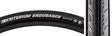 650Cx23 Kriterium Enduro Sport Bicycle Tire, a black tube with white text, designed for race and training, featuring grooved side tread, dual-layer puncture protection, and HRC compound for durability and comfort.