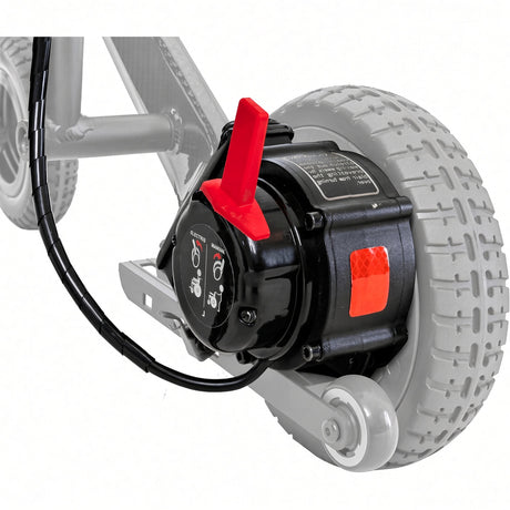 Close-up of a black electric scooter motor assembly with a red switch handle and orange reflector, mounted beside a gray treaded wheel on a white background.