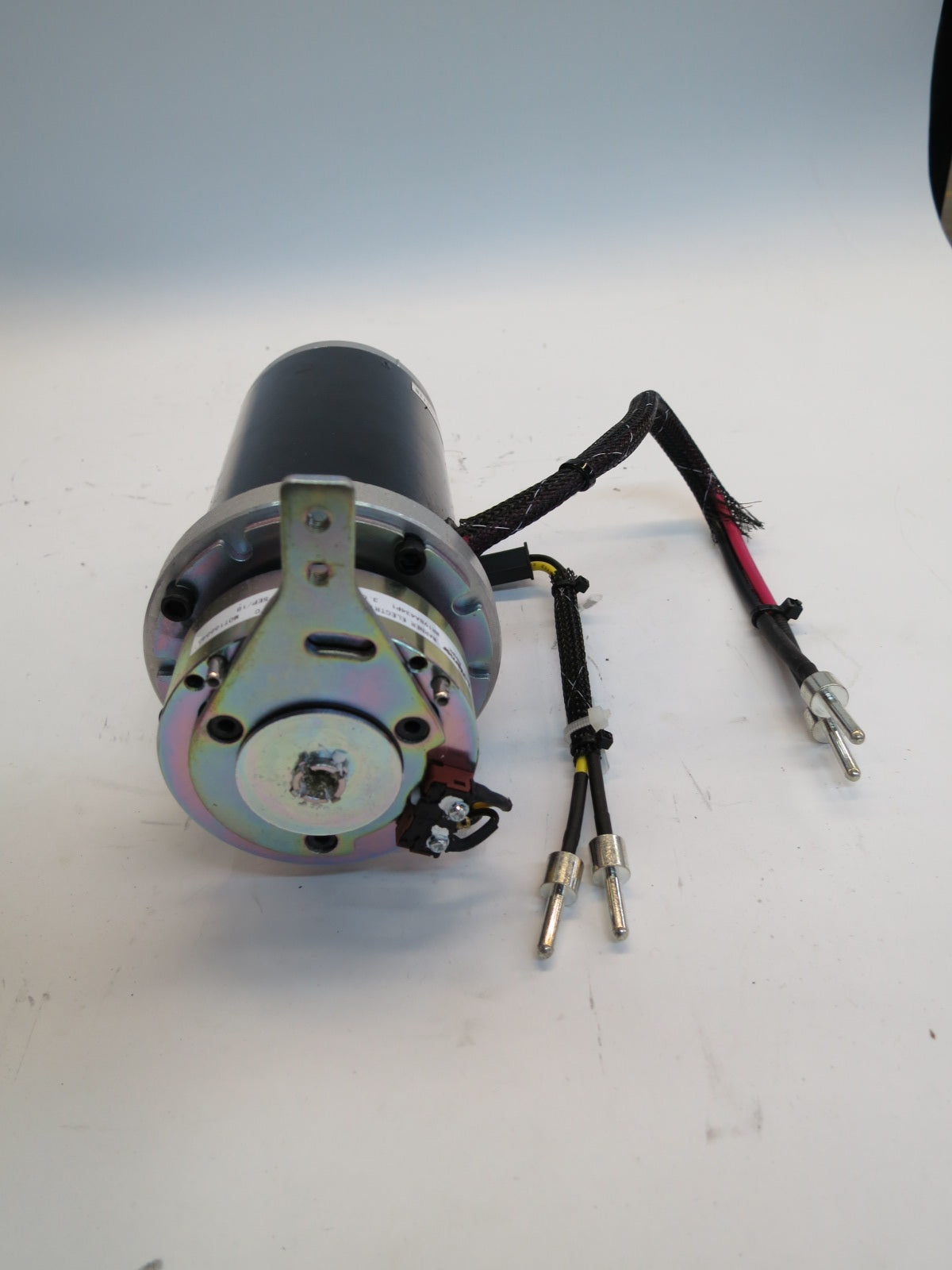 Motor (AA250002047) & Brake Assembly with Power Connector for the Go-Go Elite Traveller (SC40E/SC44E) & Ultra X (SC40X/SC44X) Mobility Scooters (Blemished), showing close-up of the small electric motor with wires.