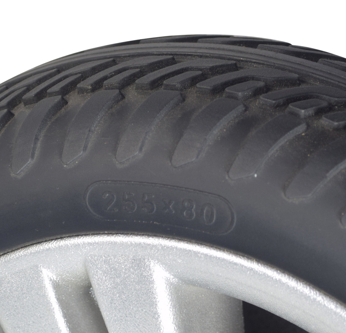 Close-up of the Flat-Free Black Front Wheel Assembly for the ActiveCare Pilot 2410 Mobility Scooter, showcasing the tire tread and 6202Z size bearings, ready to bolt on.