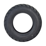 Kenda 130/90-10 Dual Sport Scooter Tire with K761 Tread, showcasing an aggressive tread pattern suitable for on and off-road use.