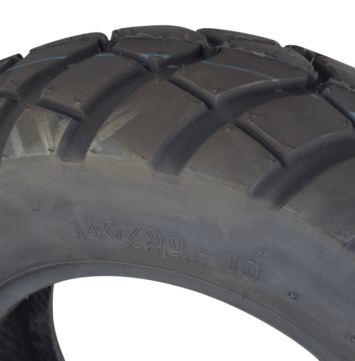 Kenda 130/90-10 Dual Sport Scooter Tire with K761 Tread, featuring an aggressive tread pattern ideal for on and off-road use.