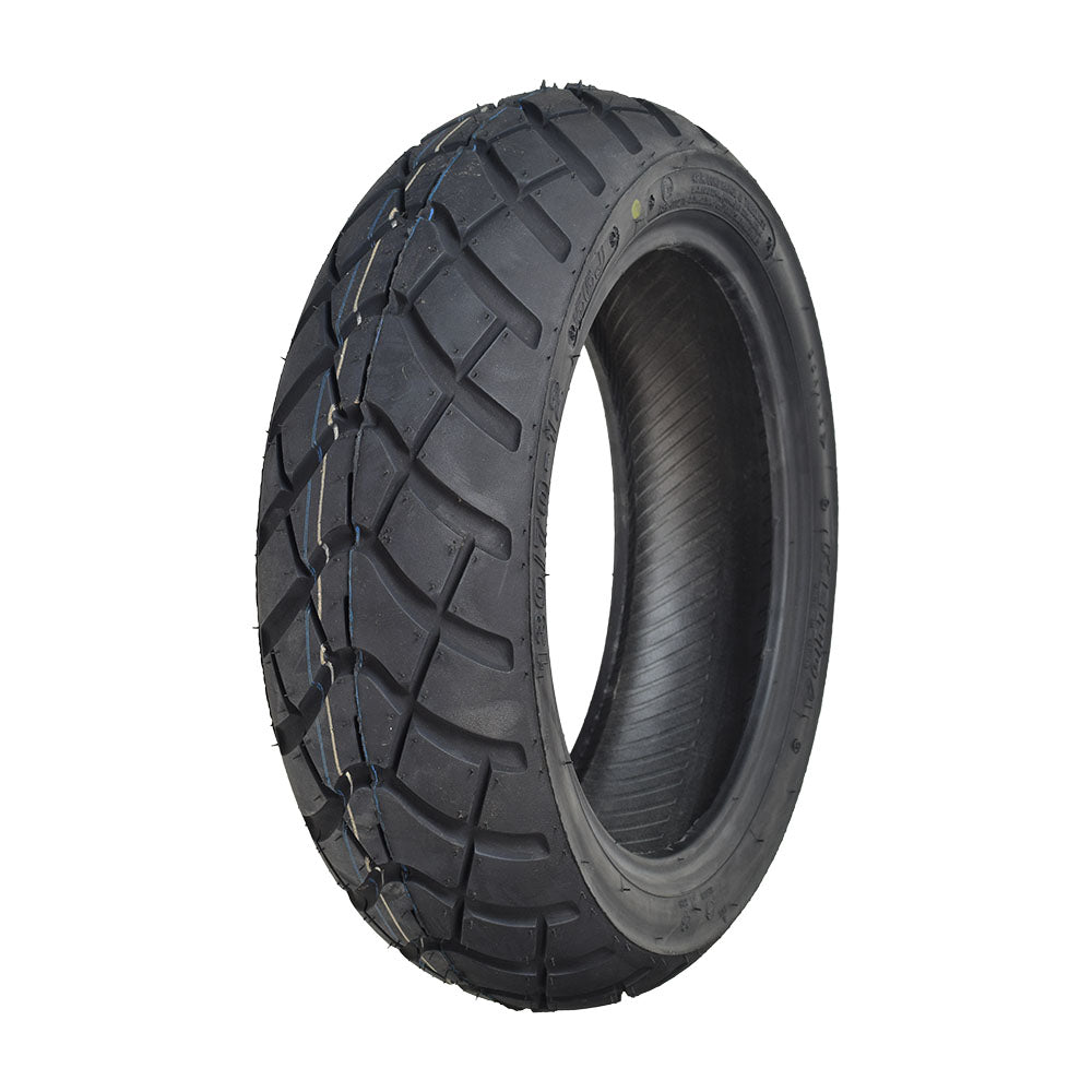 Kenda 130/70-12 Dual Sport Scooter Tire with K761 Tread; close-up of tire showcasing its thin, aggressive tread pattern for on and off-road performance.