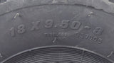 Close-up of a Carlisle 18X9.50-8 Knobby Tire, showcasing its aggressive tread pattern designed for superior grip on off-road terrains, ideal for ATVs, go-karts, and utility vehicles.