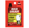 Close-up of a package labeled Dielectric Bulb Grease - Single-Use 4g Pouch, showcasing AGS dielectric bulb grease for extending bulb life and improving performance by sealing out moisture and corrosion.