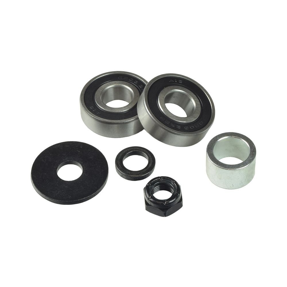 Rear Caster Anti-Flutter Kit for Jazzy & Quantum Power Chairs featuring a close-up of bearings, a metal ring, a Nylock nut, and washers, essential for smooth caster assembly operation.