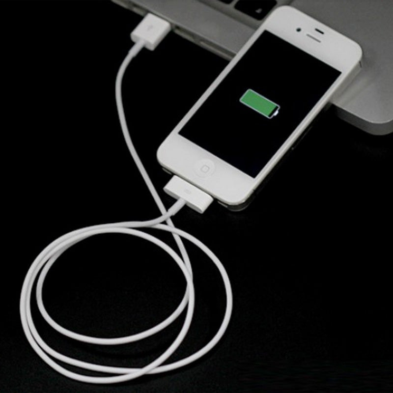 USB Charging Cable for Apple iPhone 3G/3Gs/4/4Gs, iPad 1/2/3, iPod Nano 5th/6th Generations, & iPod Touch 3rd/4th Generations, connected to a white cell phone charging on a laptop.