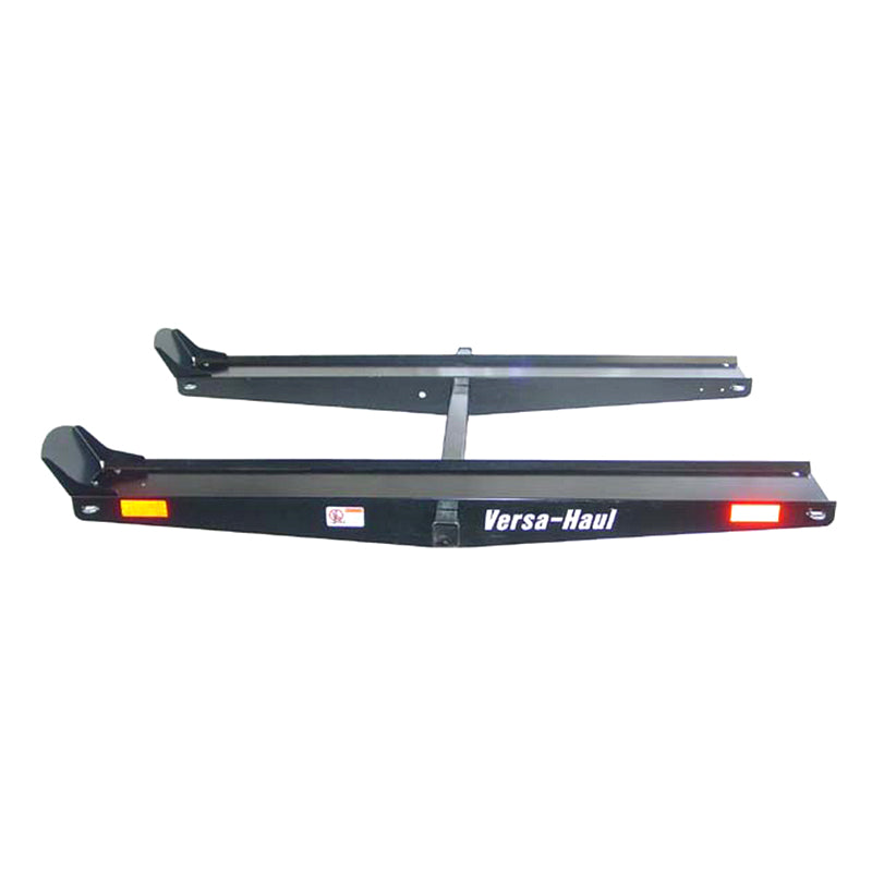 ATV and Go-Kart Carrier with black metal frame featuring red lights, built strong with 700 lbs. capacity, designed for transporting off-road vehicles.