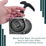 Hand holding a Recoil Pull Start for 48cc - 80cc 2-Stroke Bicycle Engine Kits, featuring a sturdy metal housing and handle.