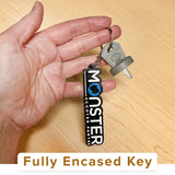 Hand holding a key chain, displaying the Key for the Golden Technologies Companion I (GC240) and II (GC340, GC440) Scooters (Type 2 Models 2013 and Later), with a close-up of the logo visible.