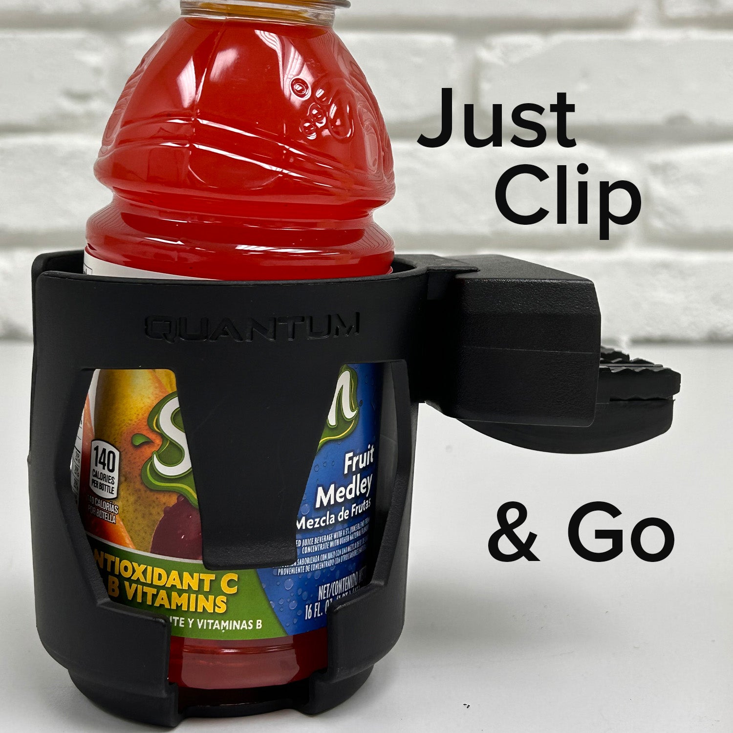 Cup Holder for Quantum Power Chairs with Tru-Balance Seating, shown holding a bottle of juice securely in a black plastic mount, compatible with various Tru-Balance seating configurations.