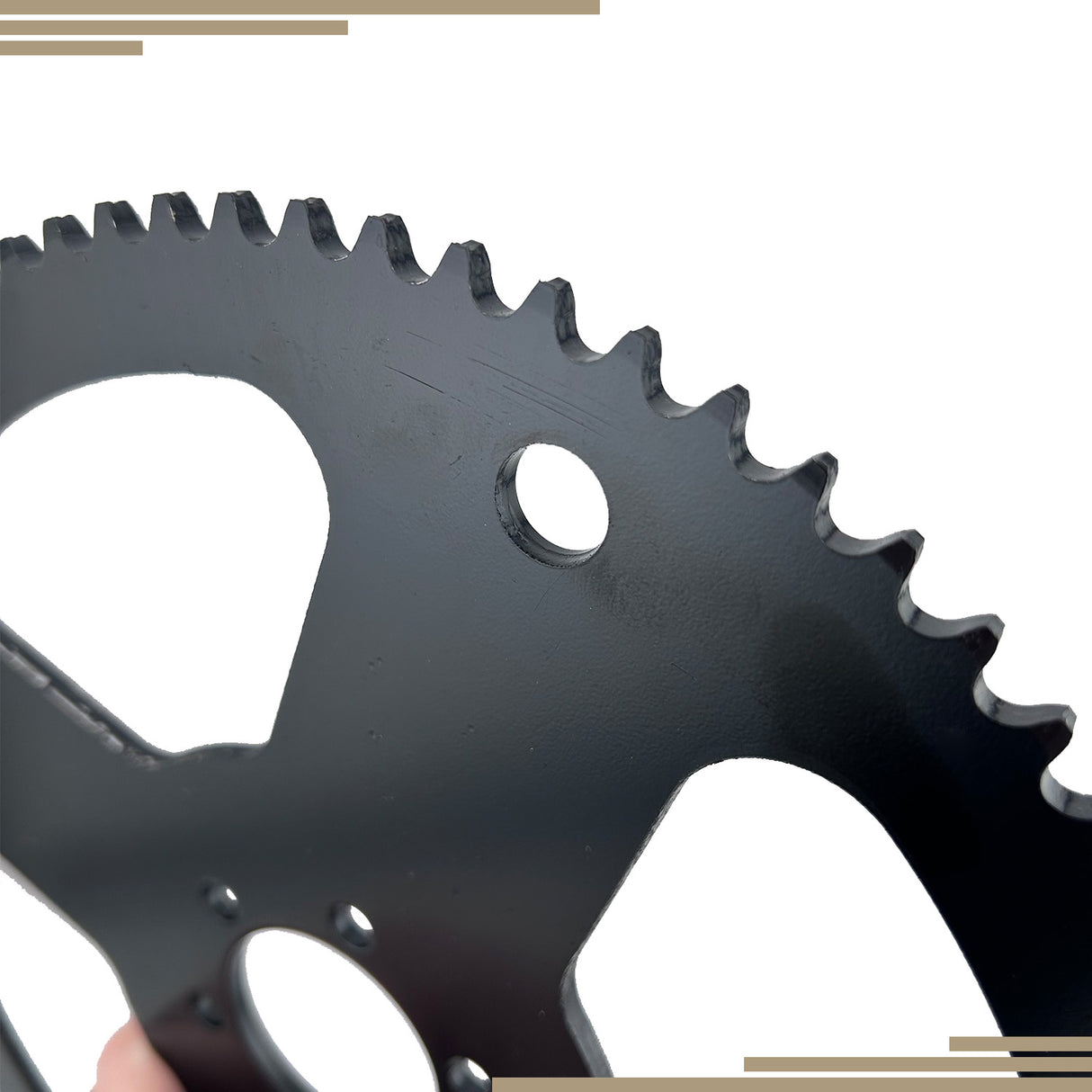 Close-up of the 75 Tooth #35 Chain Rear Wheel Sprocket for the Realtree RT100 Mini Bike, showcasing its gear teeth and central mounting hole for easy attachment to the rear wheel assembly.