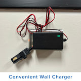 12 Volt Battery Charger for Power Wheels Ride-On Toys; black rectangular device with red and black wires, green light indicator, and a unique square-end connector.