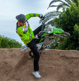 Man performing a dirt bike stunt, highlighting the HB3650-TYD6-FS Control Module with 6-Wire Throttle Connector for Razor MX500 (Versions 21+), MX650 (Versions 14+), RSF650, EcoSmart Metro, and Pocket Mod Bellezza scooters.