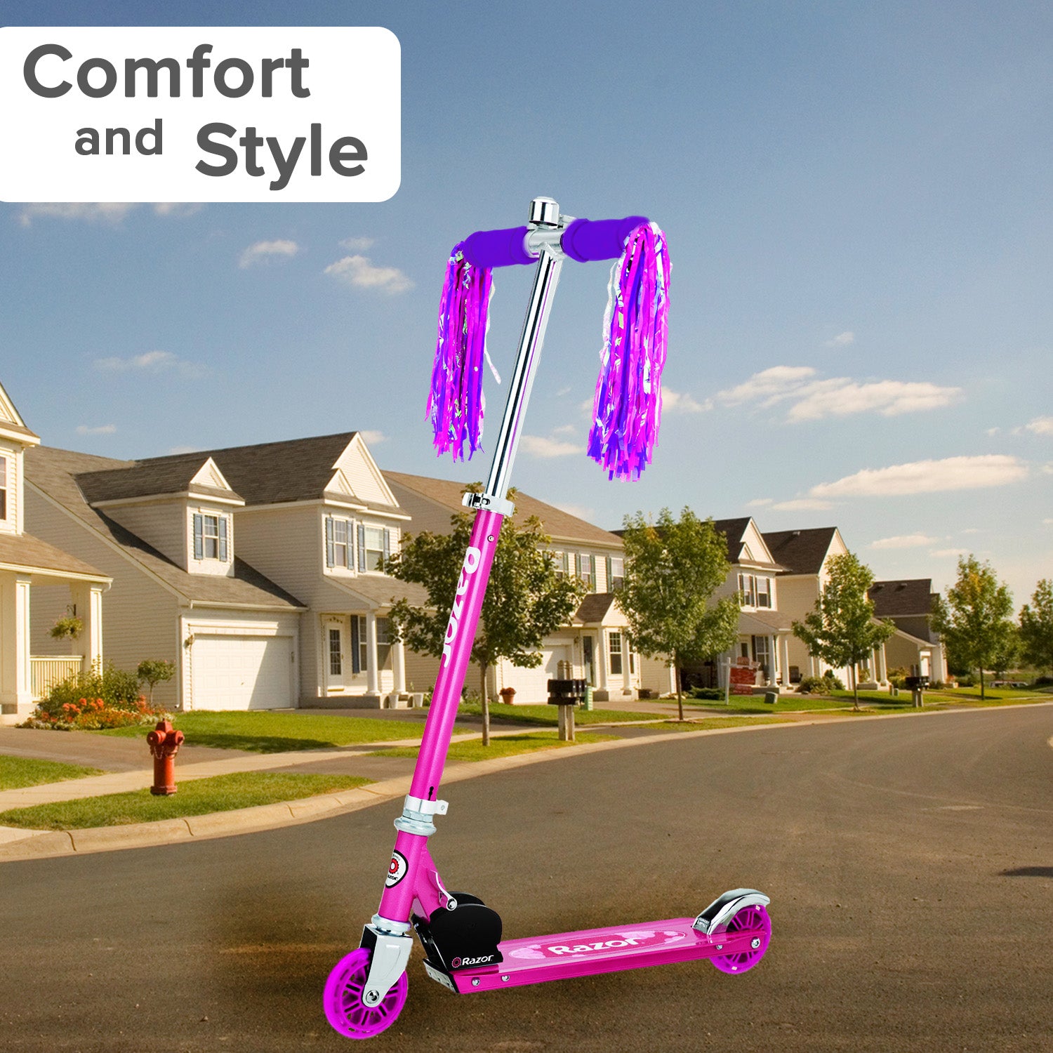 Handlebar Grip Set for Razor Kick Scooters & PowerWings, featuring soft foam grips with tassels on the handles, mounted on a pink scooter parked on a street.