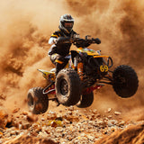 Person performing a high jump on a quad bike, highlighting the rugged, durable #40/41/420 Chain - 60 Tooth Rear Sprocket for Mini Bikes, designed for heavy-duty trail and suburban use.