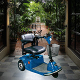 Key for Drive Daytona, Daytona GT, Mini Phantom, Phantom, Phoenix, Phoenix HD, and Stingray mobility scooters, shown placed in the ignition of a blue mobility scooter with a basket in a courtyard.