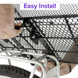 Close-up of a man's hands installing the Market-Style Rear Basket for Bicycles (Axiom) on a bike rack, showcasing its vinyl-dipped steel wire mesh and sturdy construction.