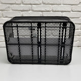 Market-Style Rear Basket for Bicycles (Axiom) - Black metal wire mesh basket with an open top, mounted on a white surface, designed for rear bike racks, features sturdy construction and a cut-away section for seat clearance.