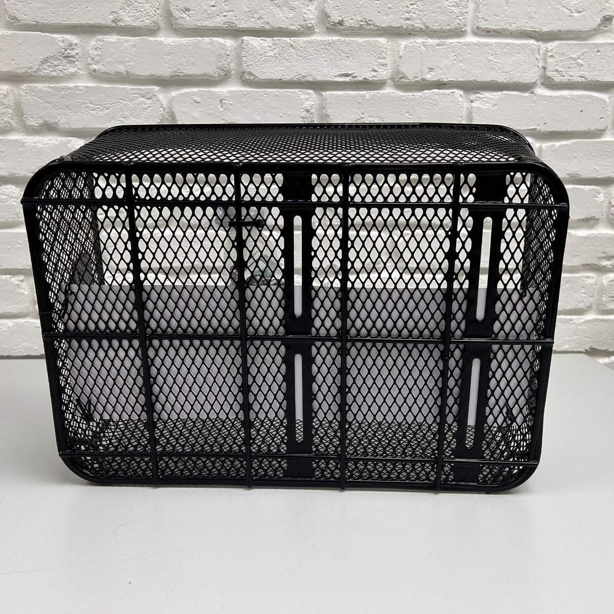 Market-Style Rear Basket for Bicycles (Axiom) (Missing Hardware) - black metal open-top basket with vinyl-dipped steel wire mesh construction, designed for permanent mounting on bike's rear rack.