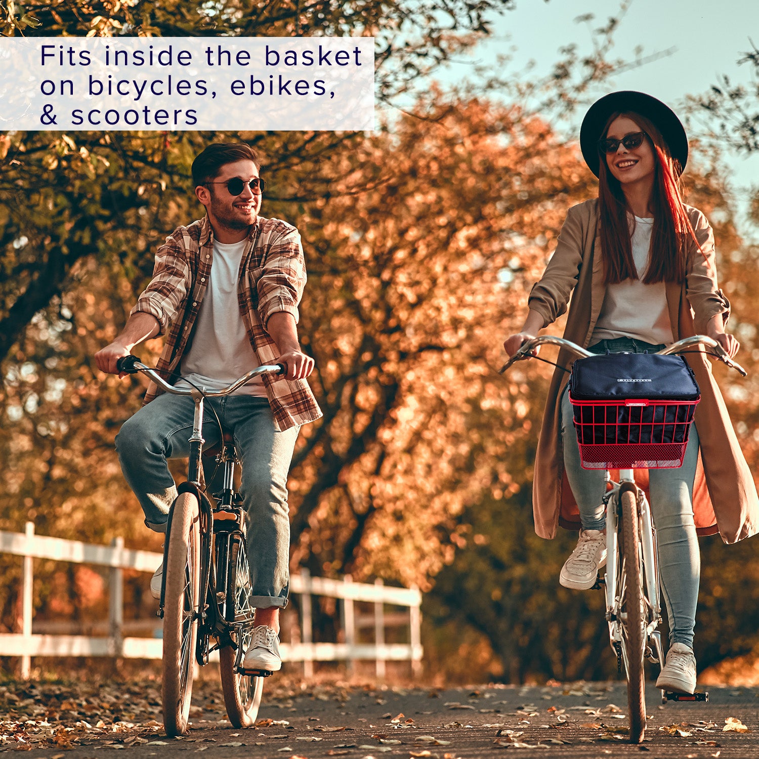 Insulated Basket Bag for Bicycles, E-Bikes, & Scooters mounted on a bicycle's front handlebar basket, with man and woman riding bicycles in the background.