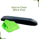 Black Vinyl Co-Molded Armrest Pad for Pride Scooters placed on a black surface, featuring a green cloth beside it.