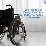 24x1 Solid Urethane Treadless Tire for Drive Medical Wheelchairs, shown close-up, mounted on a wheelchair wheel indoors, emphasizing its slick, treadless design suitable for both indoor and sidewalk use.