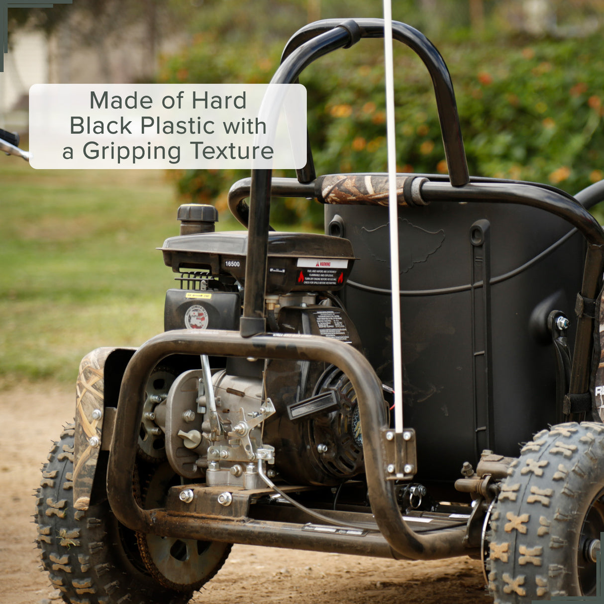 Seat for the Monster Moto / Mega Moto MM-K80 80cc Go-Kart, featuring a secure black plastic bucket design with safety belt slots, visible on a dirt road.