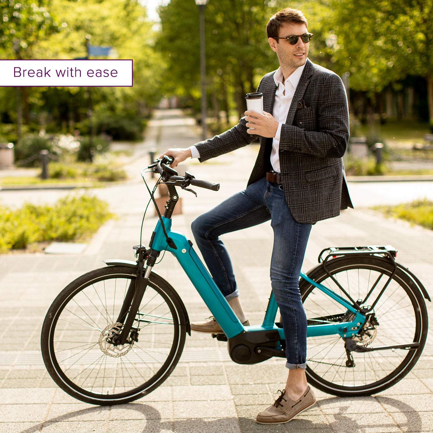 A man on a bicycle holding a coffee cup with a focus on the 53 mm Cantilever & U-Brake Pads, perfect for enhancing the braking system of your bike or scooter.