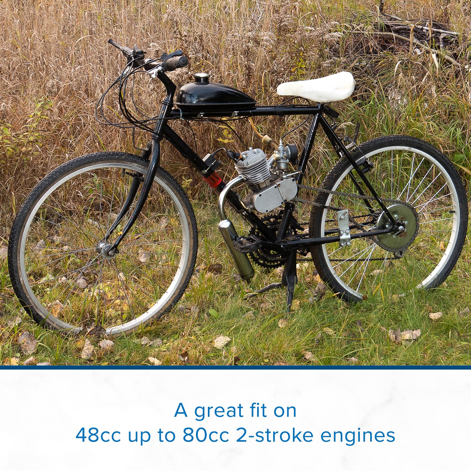 Z4C Spark Plug for 80cc 2-Stroke Bicycle Engine Kits shown in a field, highlighting its compatibility with small gas engines.