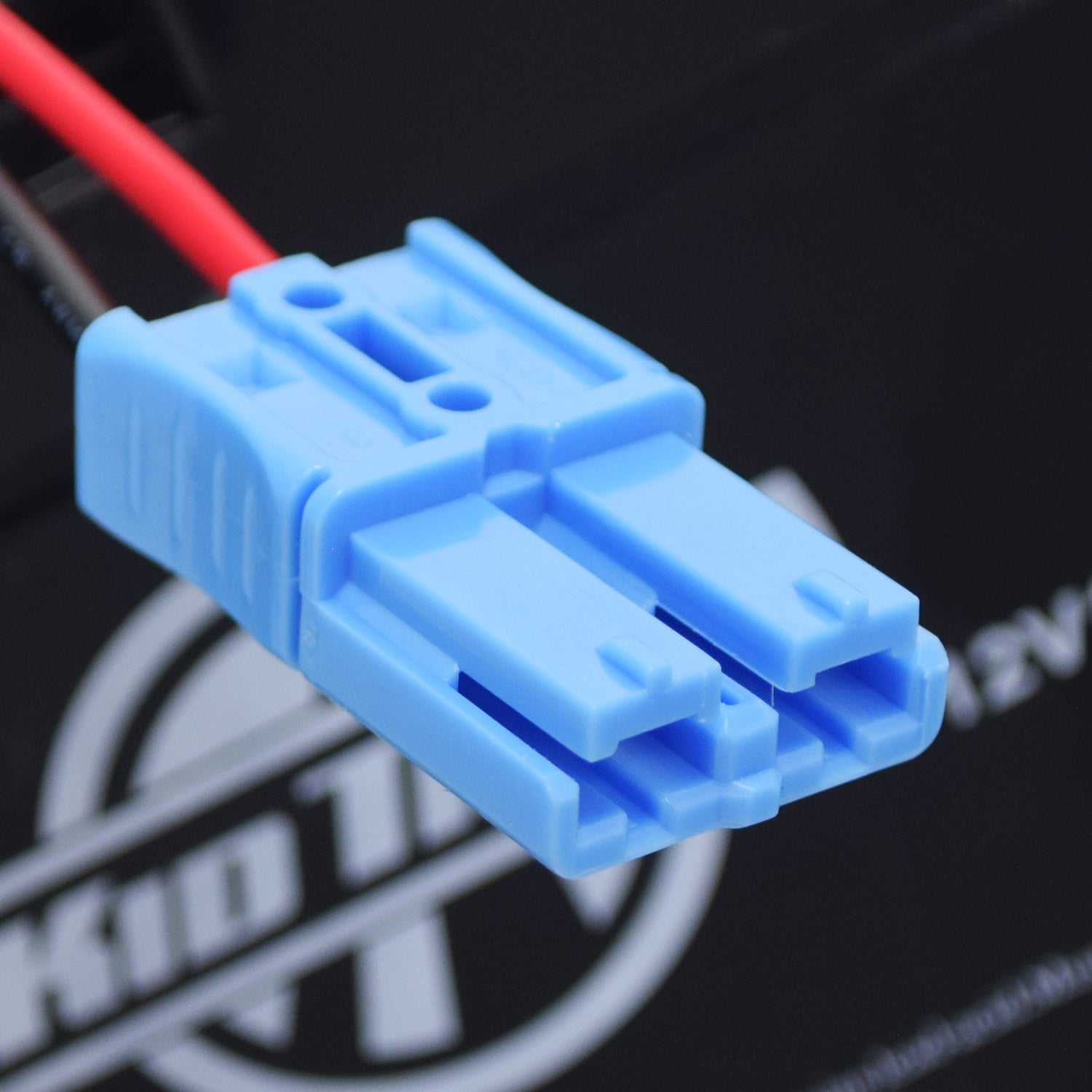 12 Volt 10 Ah Battery with 2-Wire Harness & 1 Blue Grid Connector for Kid Trax Ride-On Toys, showing a close-up of the blue plug with attached red wire for easy installation.