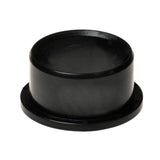 Black Delrin Flange Bushing for the Jazzy 614 and 614 HD power chairs, shown as a close-up of its round and smooth black surface.