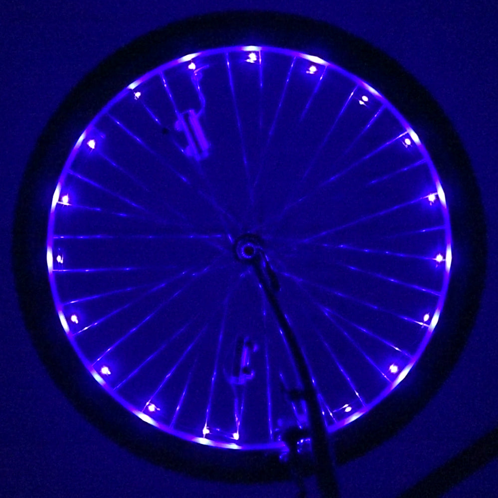 LED Bicycle Rim Spoke String Lights wrapped around a bicycle wheel, displaying the lights in a circular pattern.