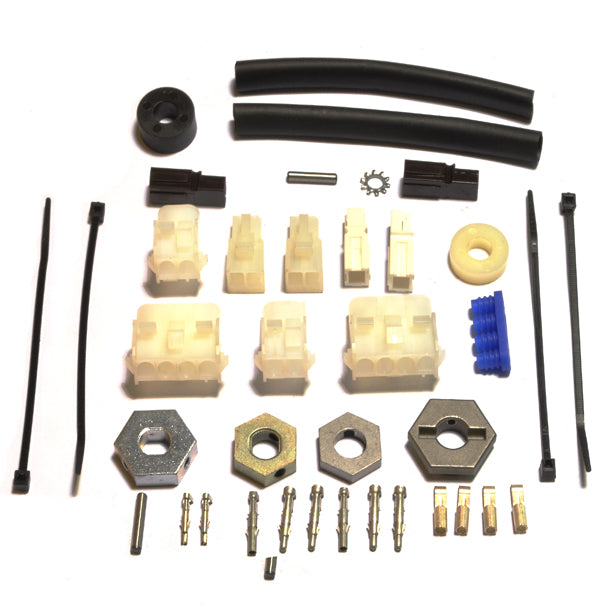 Brake Installation Kit for Pride Victory XL featuring various plastic parts including hexagon shapes, round objects with holes, and different electronic connector housings and pins needed for installation.