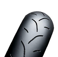 Close-up of the Bridgestone 120/80-12 BT601 SS Racing Rear Tire for Yamaha YSR50, highlighting its tread pattern designed for superior grip on racing surfaces.