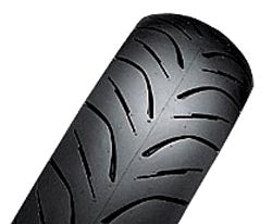 Close-up of Bridgestone 150/70-13 M/C HOOP B02R Rear Tire for 2002 - 2007 Honda Silver Wing, showcasing its black synthetic rubber texture and tread pattern designed for high performance.